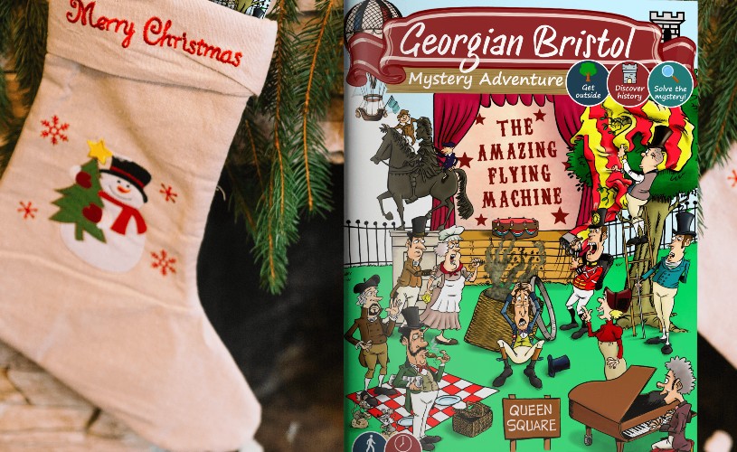 Mystery Guides' Georgian adventure story guide next to a Christmas stocking
